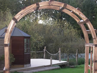 Archway, path to cantilevered timber jetty, Ledbury